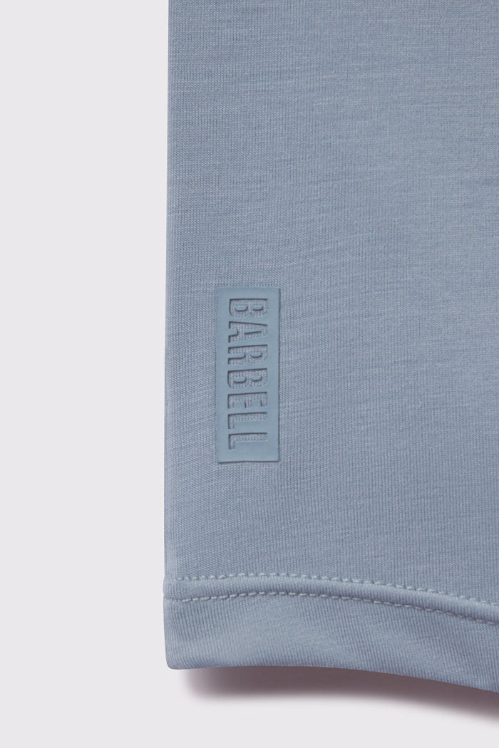 Arid Drop Hem Long Sleeve - Glacier - photo from logo detail #color_glacier