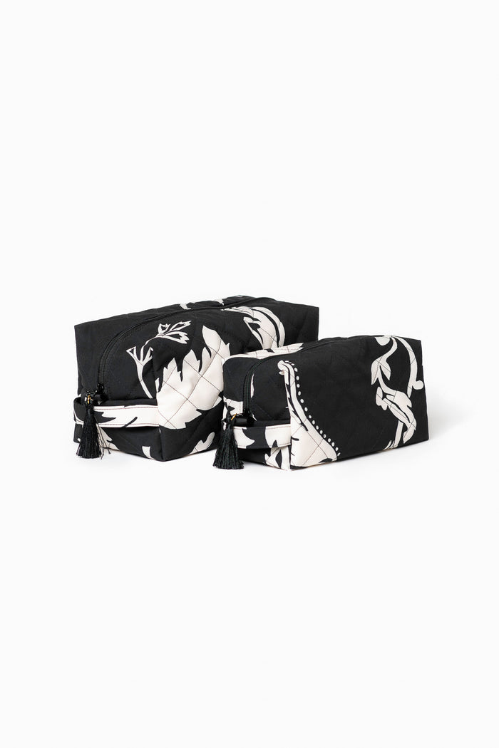 Black makeup bag set with white floral print for makeup, toiletries, and travel essentials