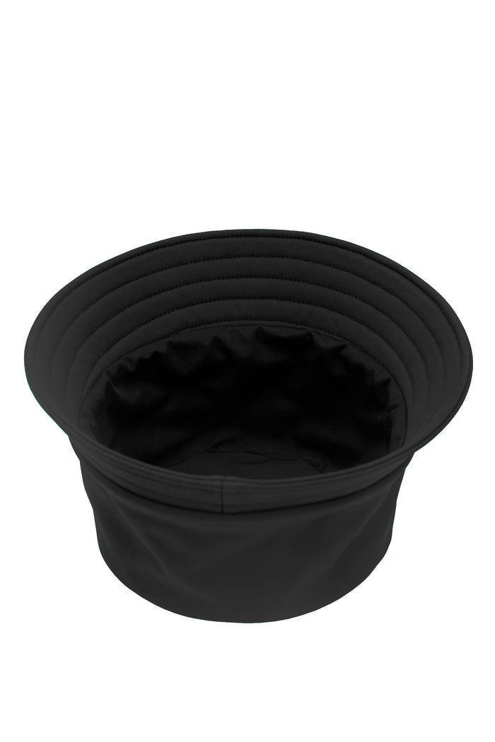 A black bucket hat with a wide, ribbed brim and a soft, flexible crown, shown from a top-down perspective on a solid white background.
