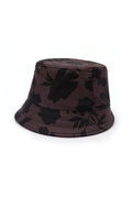 Women's brown floral bucket hat in water-resistant softshell fabric with an elegant black floral print and soft cotton lining.