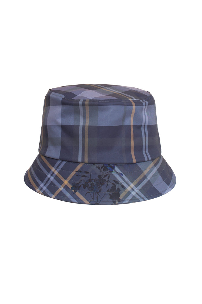 Ballad of Blue waterproof hat with feminine floral accents, ideal for rainy-day style.
