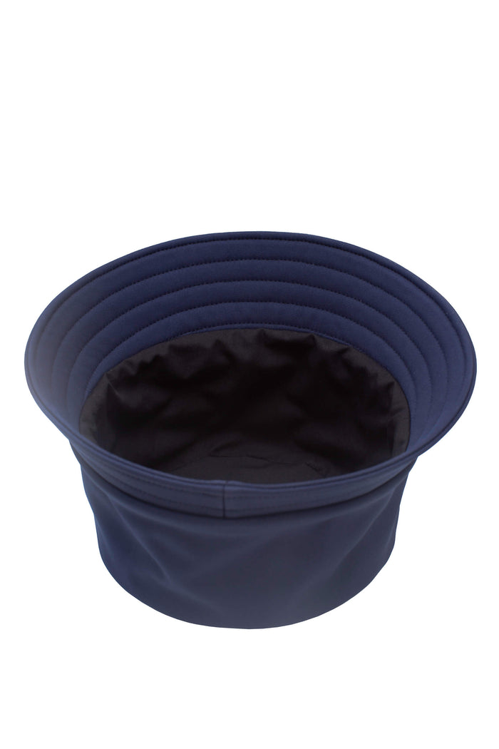 Elegant women’s blue bucket hat made from waterproof softshell fabric.