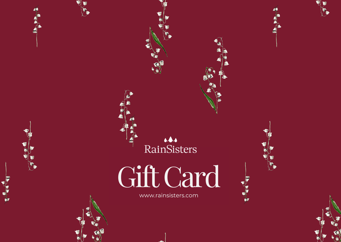 Gift card with floral pattern and 'RainSisters' branding on a red background
