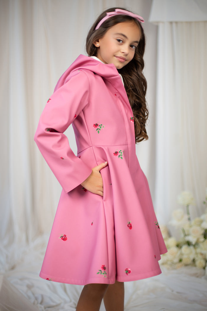 Light pink coat for girls featuring a water-resistant fabric