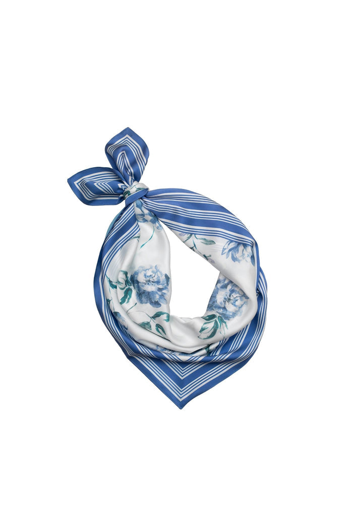 Blue and white patterned scarf on a white background.