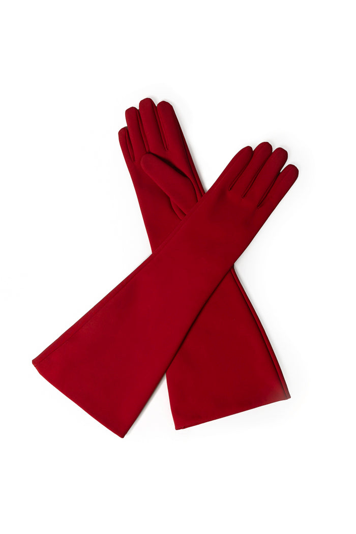 A pair of long, deep red gloves arranged in an X-shape on a clean white background.