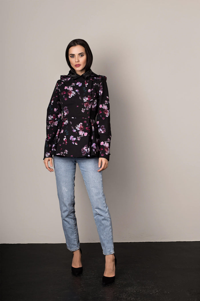 Flared peplum hem detail on fitted black floral women's jacket